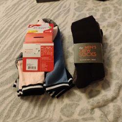A 3 Pack Of Men's Socks New And A Pair Of Ladies Socks Never Worn New 5 dollars For Both 