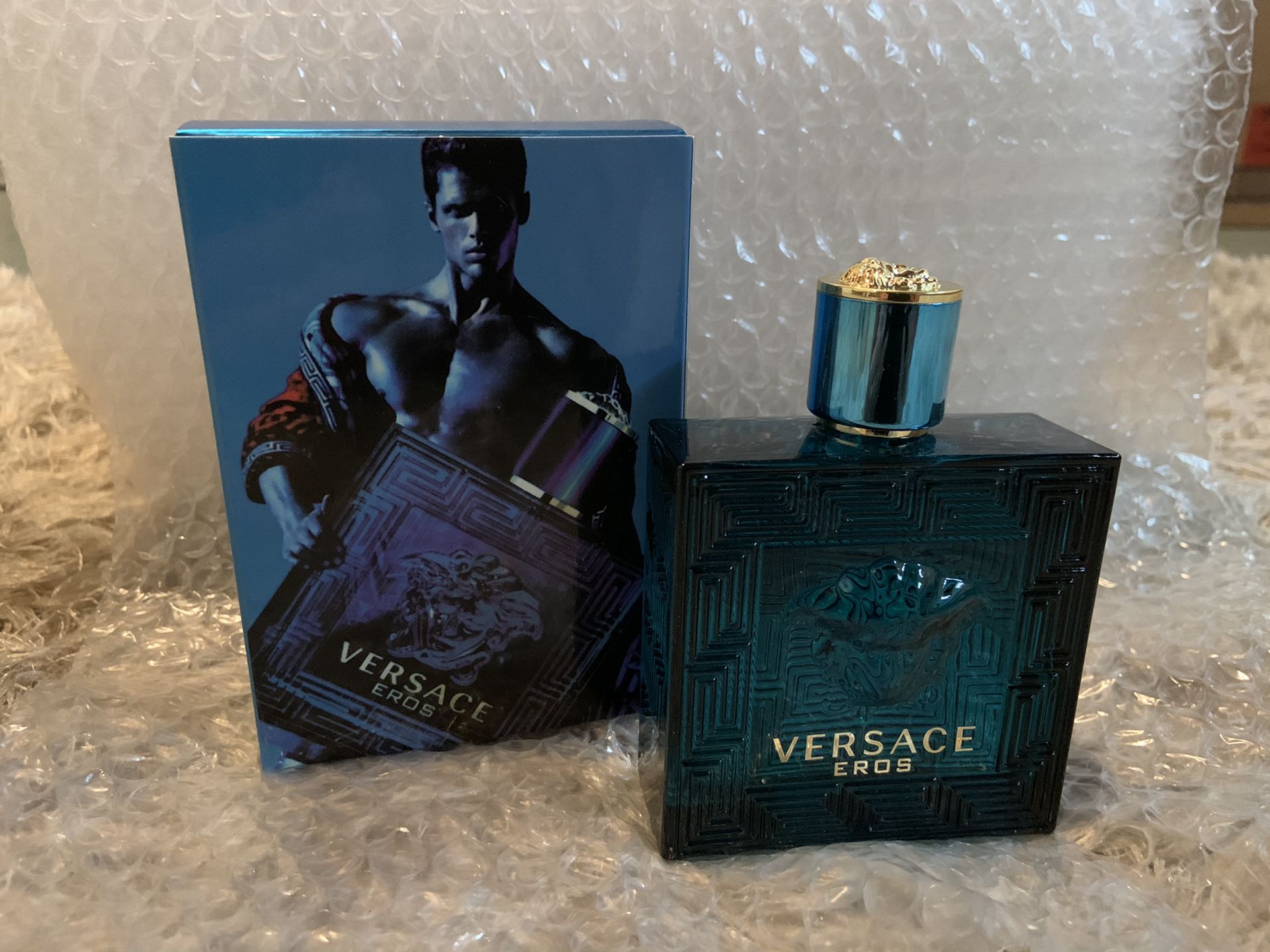Two bottle Coco Chanel and Versace Eros