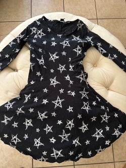 Black dress with star pattern. Size small.