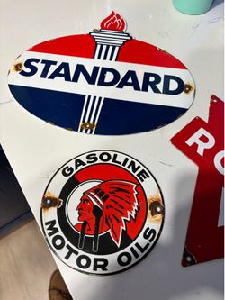 Two authentic gas pump plates.