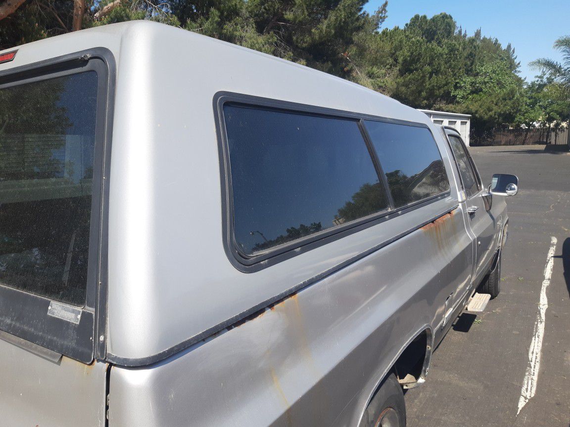 Snugtop camper shell for long bed chevy square. Body only