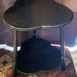 Black clover-shaped end table with two tiers