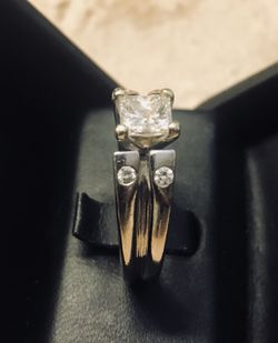 Women’s princess cut diamond ring.
