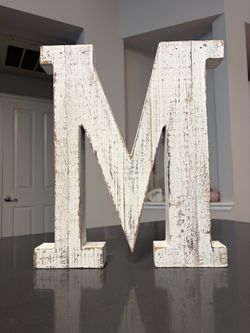 Distressed “M” decor