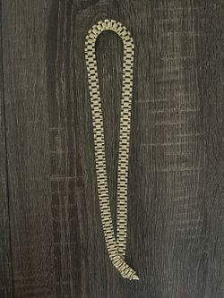 Gold Rolex chain
