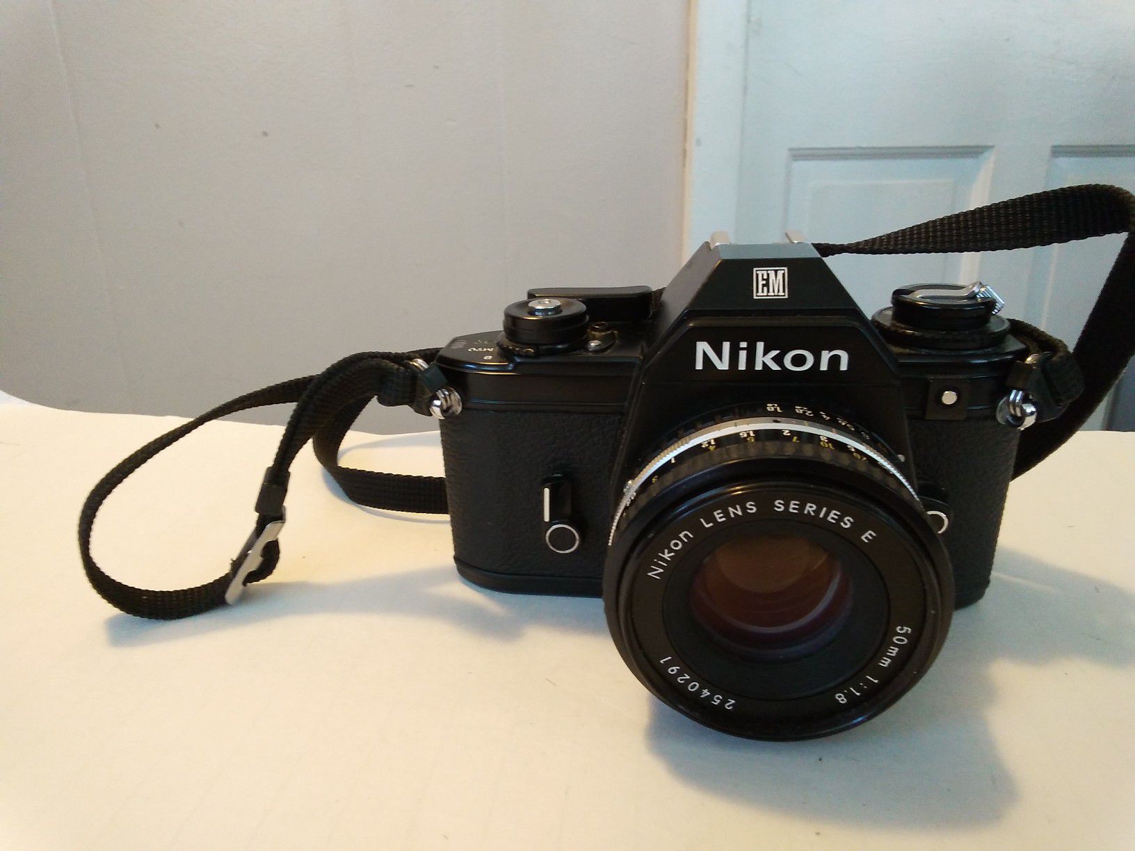 Nikon EM 35mm Film Camera with Nikon 50mm f/1.8 Lens