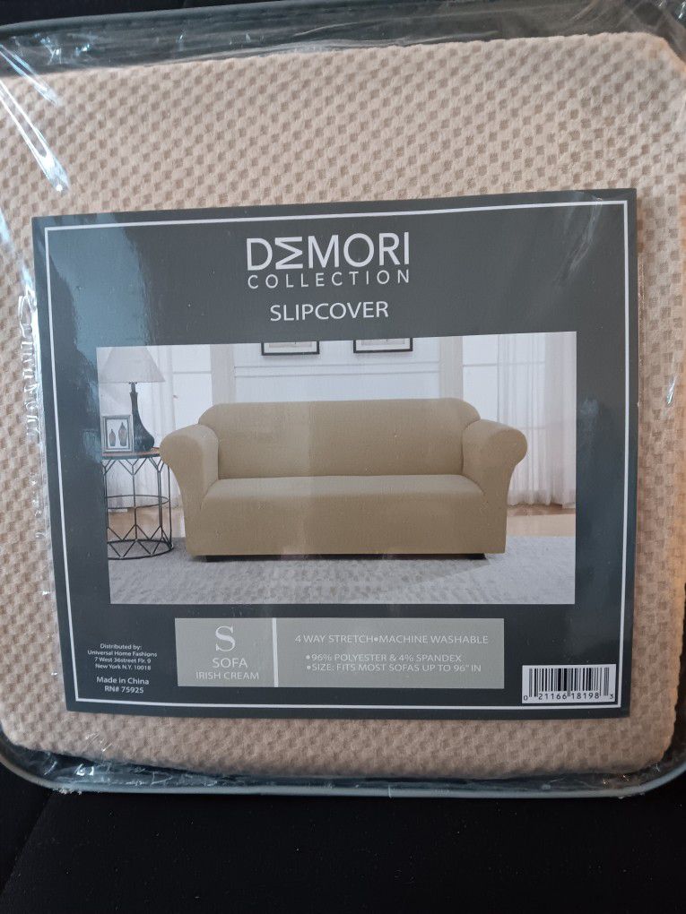 Sofa Slip Cover New In Package Size Small, Color Light Beige.