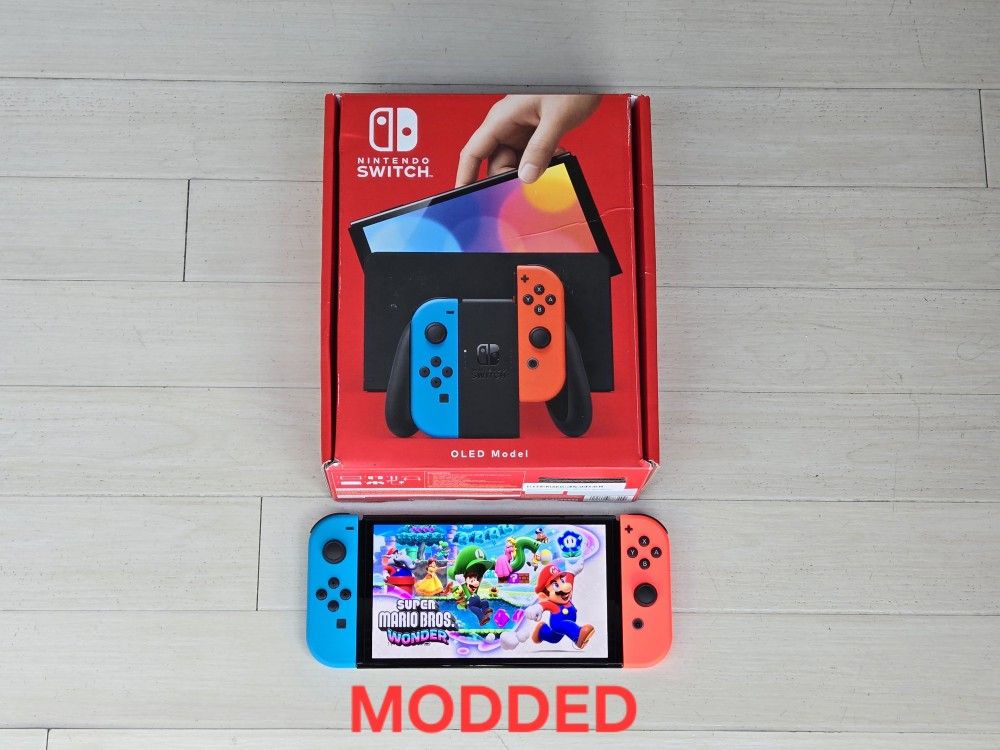 Nintendo Switch OLED (MOD) - 300 Games + 25000 Retros + Unlimited Movies