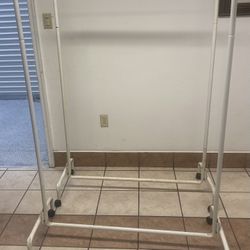 2 Clothes Racks On Wheels 