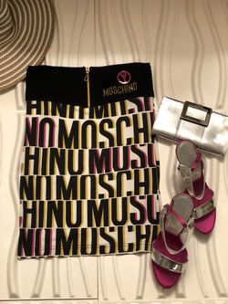 High end designer Skirt with Monogram, Size M, Stretch $50