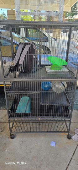Ferret animal cage. Large. Includes ramps, all parts plus add ons.