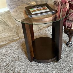 Two Round Glass-top End Tables