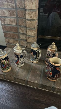 German Beer Steins with metal lid and  stein pitcher