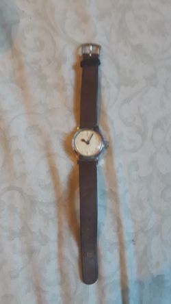 This is a neat little watch it is for the blind is Braille front of the class opens up $25