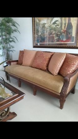 Hardwood cushioned sofa