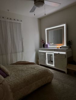 Dresser with LED lights and vanity mirror