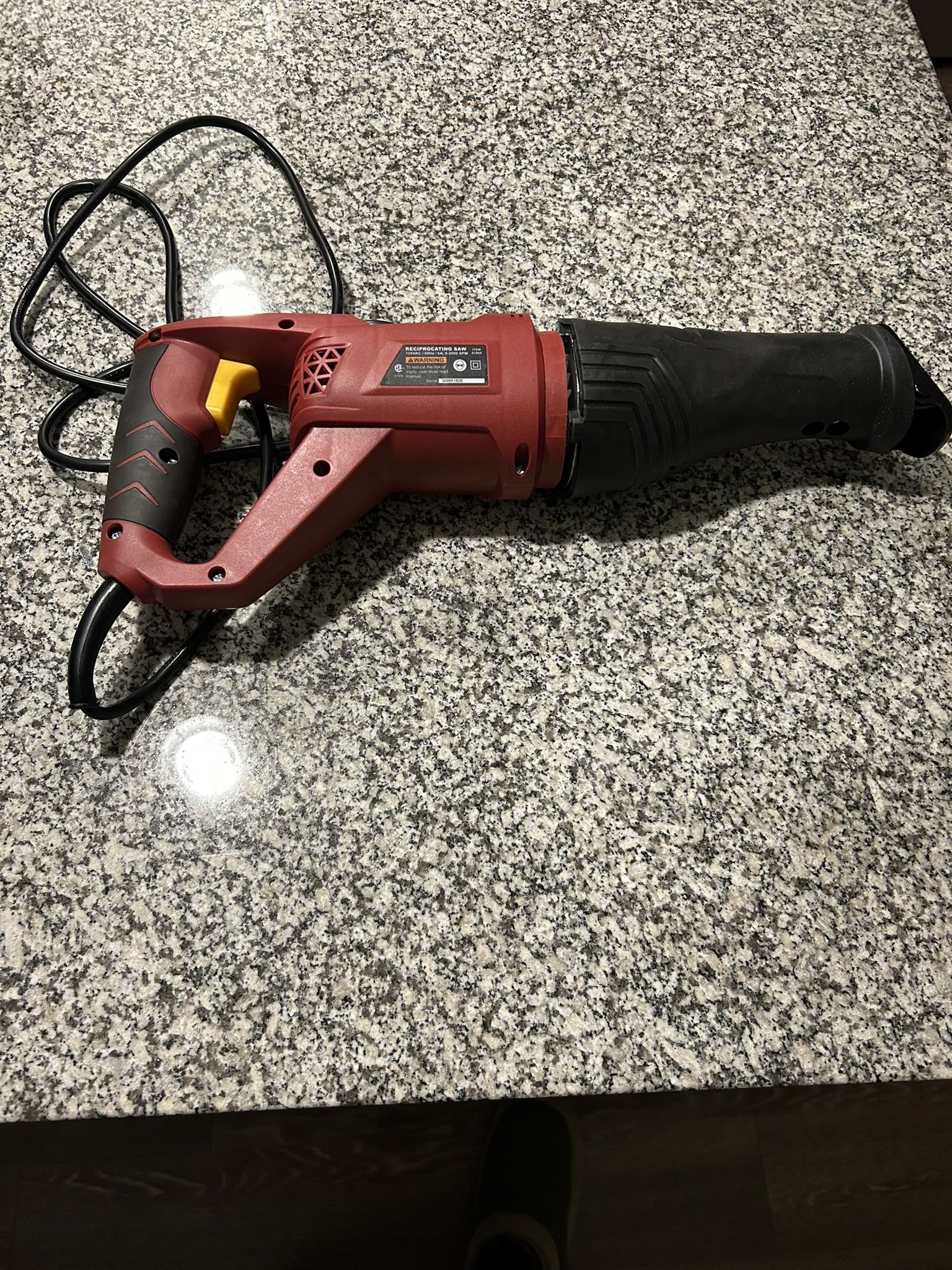 Reciprocating Saw with a Rotating Handle