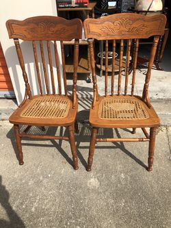 2 Vintage Wood Chairs with Cane Seats 49” h x 18” w x 18” d x 18” floor to seat Each chair $25