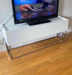 Modern white TV stand/media console with chrome metal base - excellent condition!