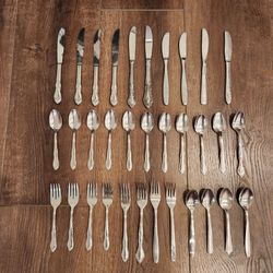 various stainless steel and silver-plated flatware, great condition
