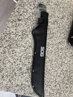 SOG (SOGFARI) MACHETE. 13 INCH, SAW BACK, SPIKED TANG FOR POUNDING, WITH SHEATH