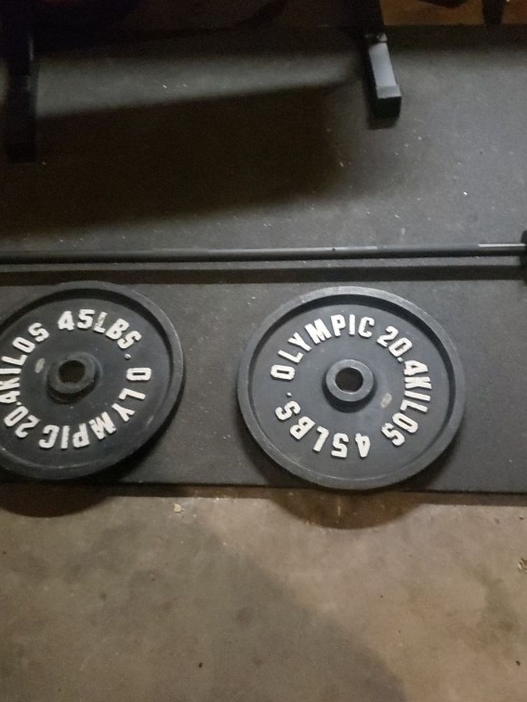 Olympic barbell And Pair Of 45's