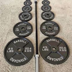Set Of Weights And Barbell 