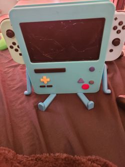 Nintendo switch bundle animal crossing station, bmo TV stand, carrying case, and accessories.