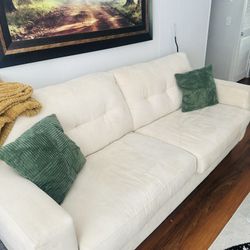 Lovely Cream Couch And Ottoman 