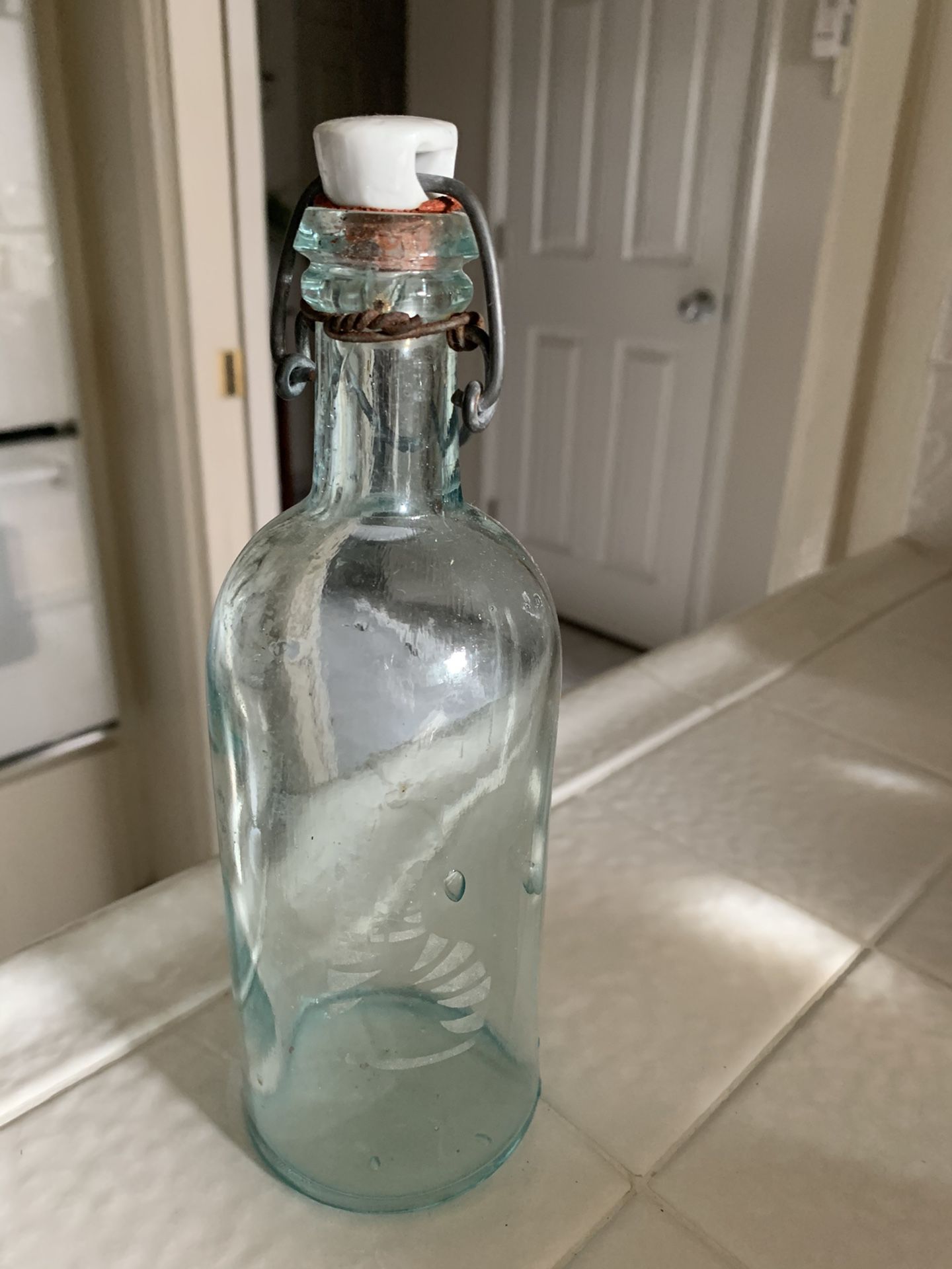 Small antique glass bottle Cat. etched in front