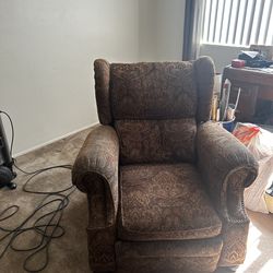 Brown paisley recliner arm chair