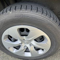 4 Nokian snow tires w/ Steel Rims