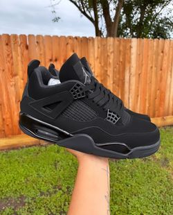 Black Cat Jordan 4s