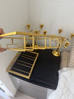 Candelabros y organizador de copas como nuevas