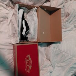 2 Pairs Of Vans