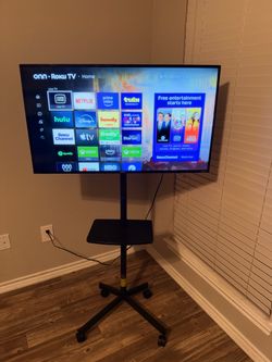 Roku 40-Inch Select Series Smart TV 2026 and stand