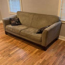 Beige Couch with Accent Pillows