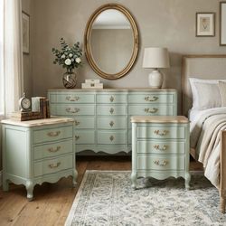 Wooden 12-drawer French provincial dresser and two three drawer nightstands