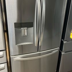 NEW OPEN BOX LG FRENCH STYLE STAINLESS STEEL REFRIGERATOR 