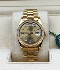 1974 Rolex Day-Date 36mm President 18k Yellow gold 1803 champagne baguette diamond dial Single Quick set watch box tag appraisal
