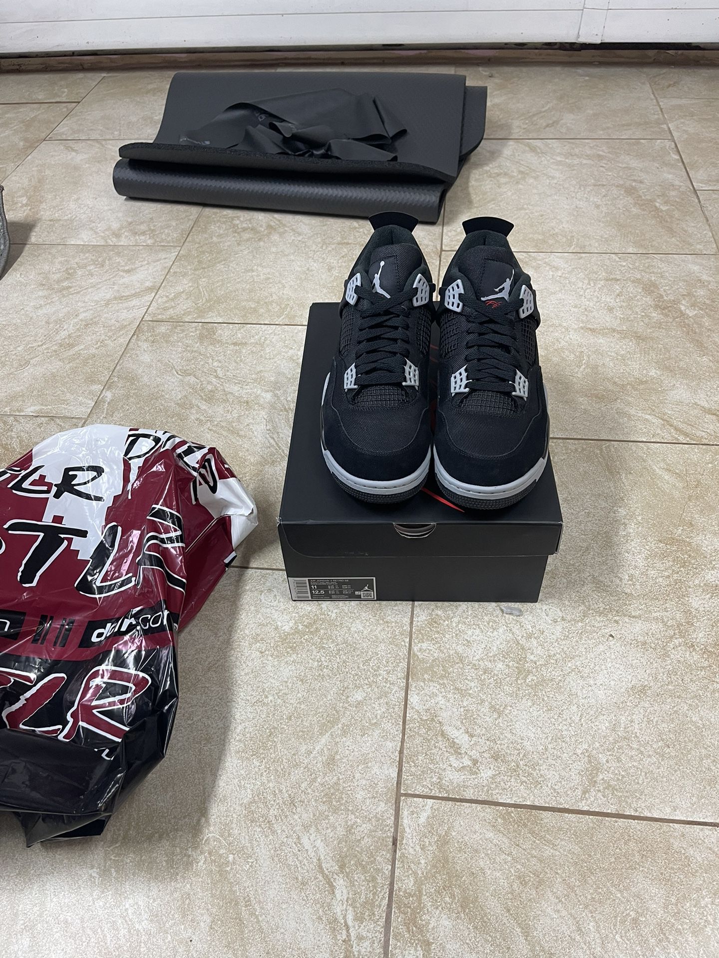 Air Jordan 4 Retro “Black Canvas” Size 11