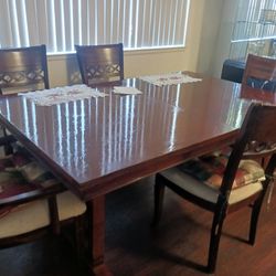 Upgrade your dining area with this elegant solid wood dining room set