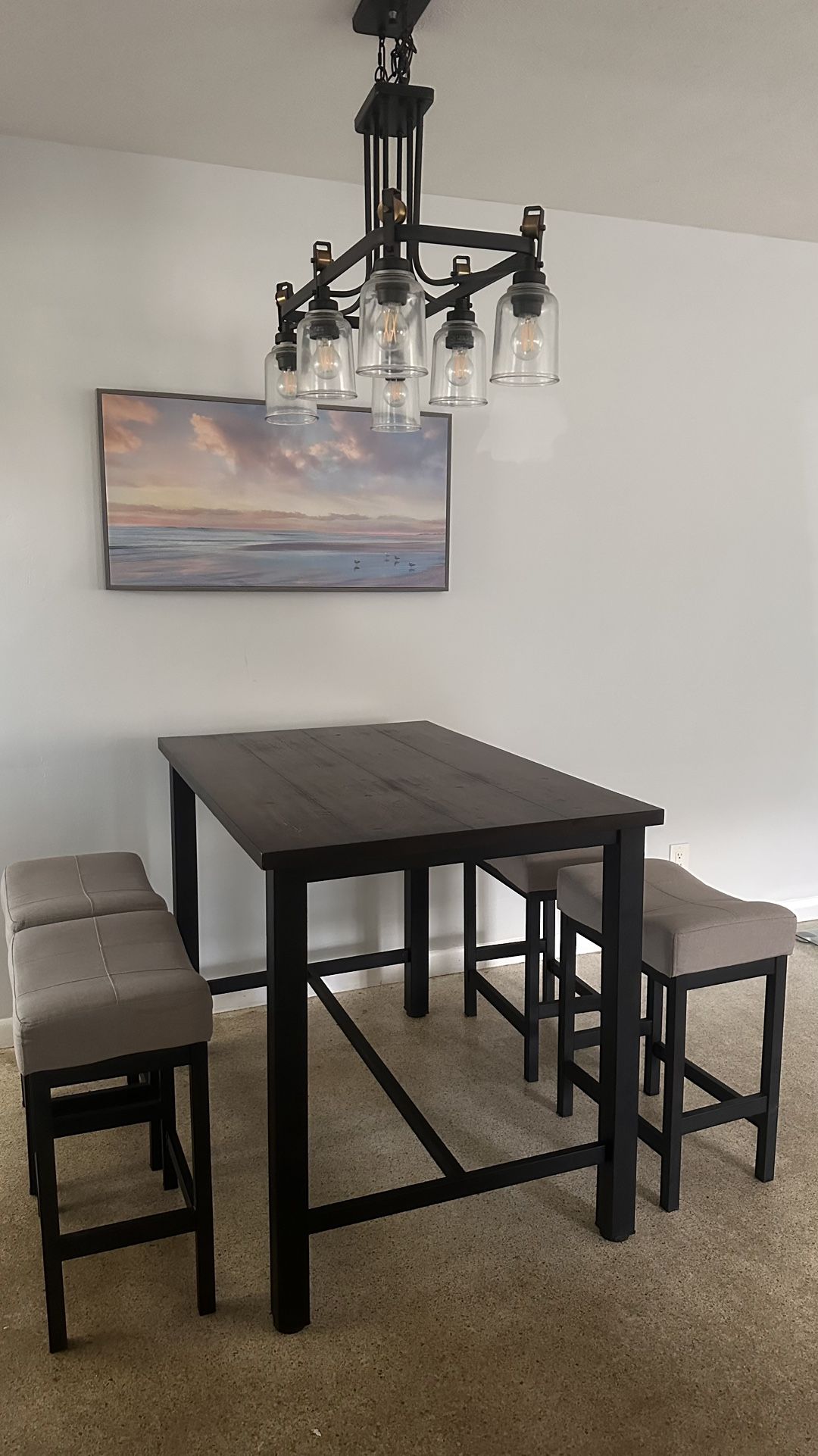 High-top table with 4 matching stools