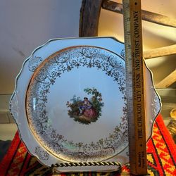 PLATO ANTIGUO DE PORCELANA FILETEADA 