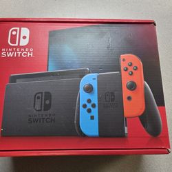 Nintendo Switch with Neon Blue and Neon Red Joy-Con