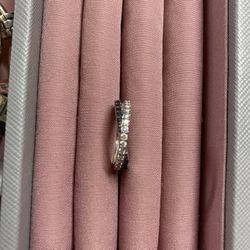 silver ring with black and white CZ