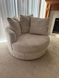 Swivel arm chair beige