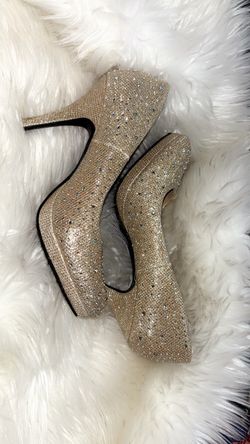 HEELS USED WITH SOME WEAR