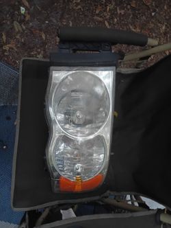 Headlight Assembly For A Dodge Truck Drivers Side