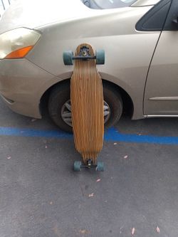 Like New Longboard With Navigator Drone Trucks